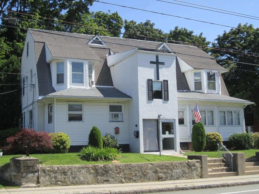 Front exterior of the home from the street at New Hope Sober House, North Providence, RI