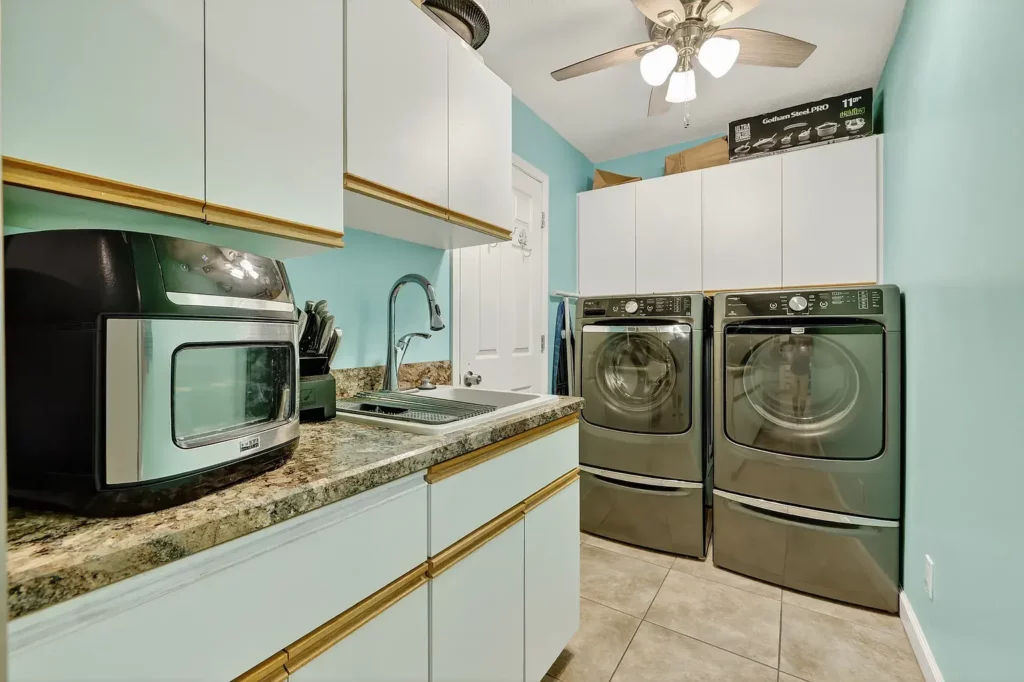 On-site laundry area at Doris Sober House sober living for men in Fort Pierce, Florida