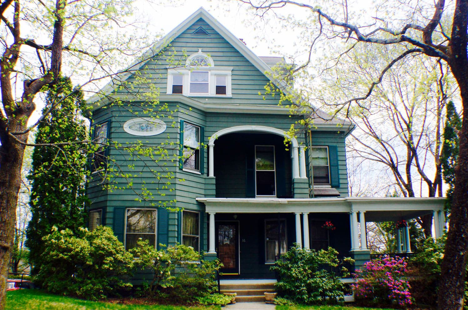 Front exterior of a large Victorian home operating as a recovery residence