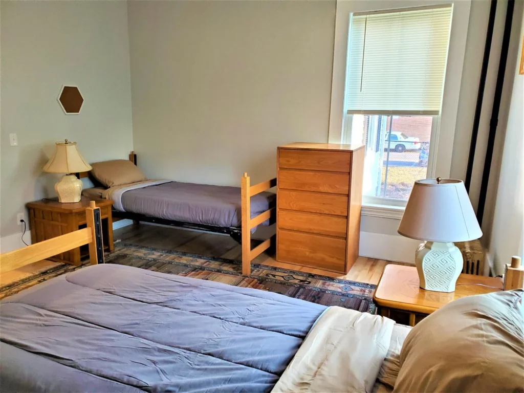 Shared bedroom with two beds