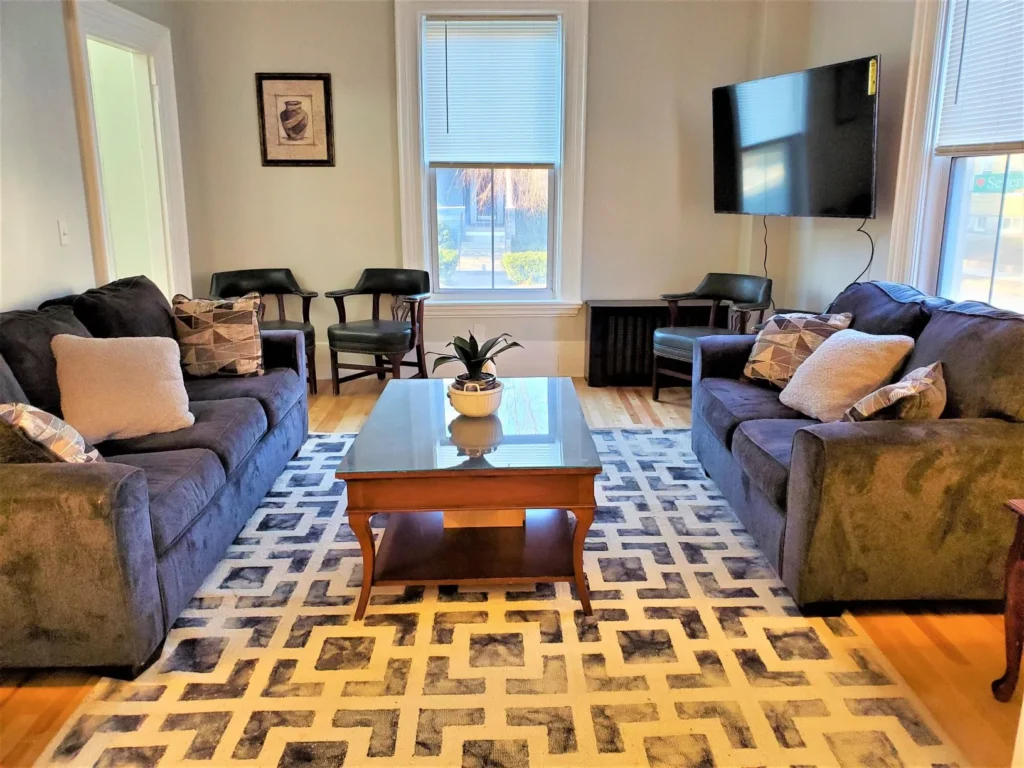 Sitting room with sofas and armchairs