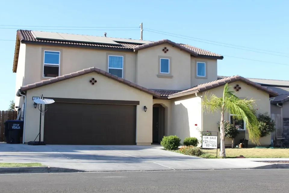 Two-story stucco home in California used as recovery housing