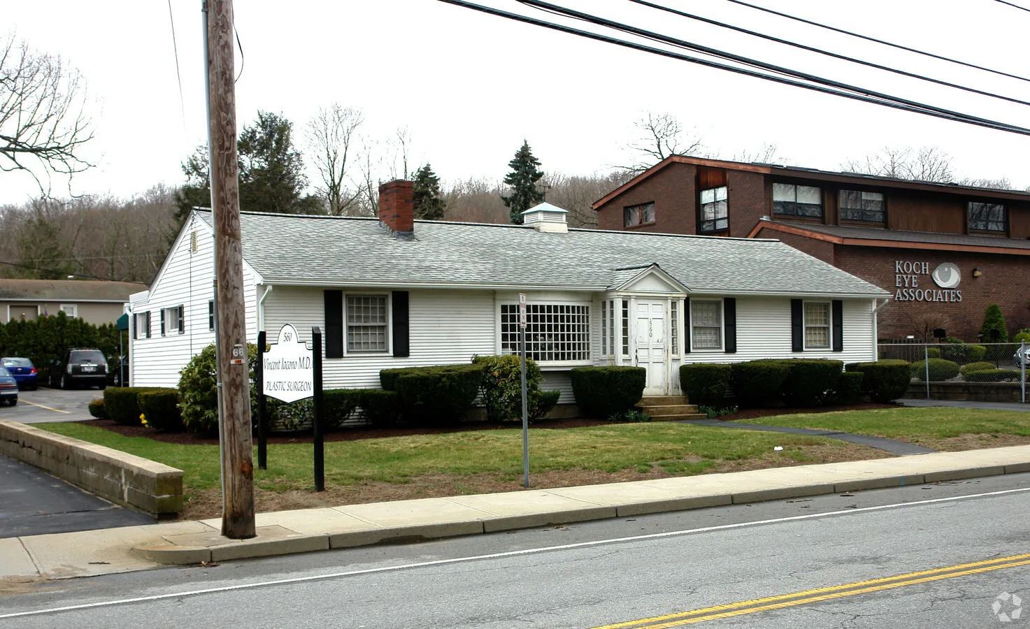 Front exterior of a large recovery residence on a residential street